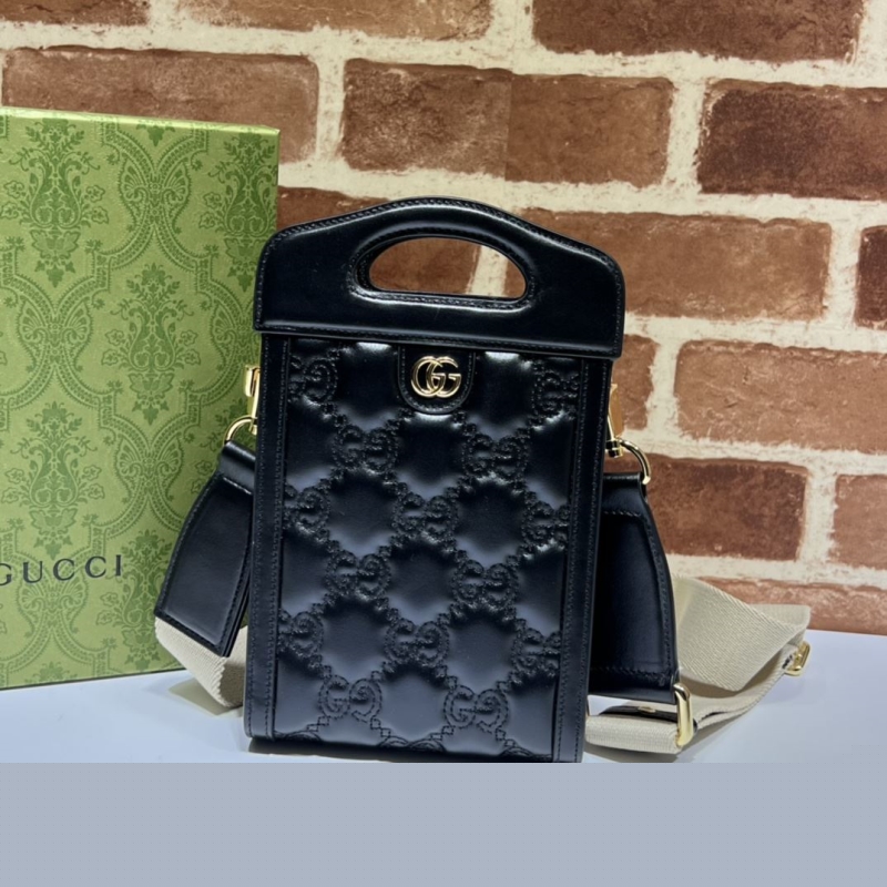 G*u*i top handle bags